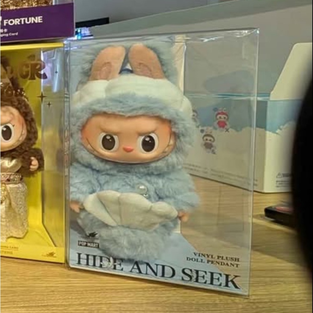 100% authentic Singapore "Hide and Seek" Labubu. Unopened box.